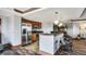 Modern kitchenette with stainless steel appliances, sleek countertops, and bar seating, ideal for casual meals and entertaining at 8100 E Union Ave # 1603, Denver, CO 80237