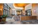 Stunning lobby area with stone floors, wood accents, and modern lighting, creating a warm and inviting atmosphere at 8100 E Union Ave # 1603, Denver, CO 80237
