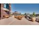 Spacious rooftop patio with dining tables, grill, and beautiful cityscape views, perfect for outdoor entertaining and relaxation at 8100 E Union Ave # 1603, Denver, CO 80237