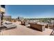 Relaxing outdoor patio with comfortable lounge seating and city views, ideal for enjoying the outdoors in a stylish setting at 8100 E Union Ave # 1603, Denver, CO 80237