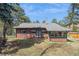 Cozy single story home featuring charming architecture and a spacious backyard ready for outdoor enjoyment at 3439 Burnham Dr, Kittredge, CO 80457