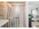 Neutral bathroom has standing shower and is conveniently located near main bedroom at 3439 Burnham Dr, Kittredge, CO 80457