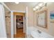 Bathroom features a modern shower and natural light at 3439 Burnham Dr, Kittredge, CO 80457