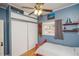 room features hardwood floors, modern lighting, and large closet for storage at 3439 Burnham Dr, Kittredge, CO 80457