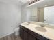 Bathroom with double sink vanity, modern fixtures, and a shower at 228 N Edge Cliff St, Castle Rock, CO 80104