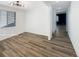 Bright living room with wood floors and modern lighting at 228 N Edge Cliff St, Castle Rock, CO 80104