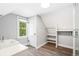 Bright bathroom with a vanity, shower, and closet space at 269 Delaware St, Denver, CO 80223