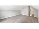 Cozy bedroom featuring plush carpeting, a storage nook, and natural light at 269 Delaware St, Denver, CO 80223
