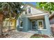 Attractive home with a beautifully landscaped front yard and welcoming front porch at 269 Delaware St, Denver, CO 80223