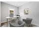 Serene home office featuring a modern desk, comfortable seating, and natural light perfect for productivity at 269 Delaware St, Denver, CO 80223