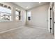 Inviting bedroom with ample natural light, plush carpet, and neutral color palette at 6834 Merseyside Ln, Castle Pines, CO 80108