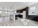 Well-lit kitchen with modern stainless steel appliances, an island, and plenty of counter space at 6834 Merseyside Ln, Castle Pines, CO 80108