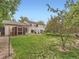 Exterior shot of the home, showcasing a well-maintained yard, a shed, and deck at 12991 E Idaho Dr, Aurora, CO 80012