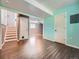Spacious finished basement with stairs and access to other rooms at 12991 E Idaho Dr, Aurora, CO 80012