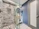 Modern bathroom featuring a unique vanity, glass shower and decorative tile at 12991 E Idaho Dr, Aurora, CO 80012