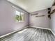 Bedroom with stylish gray walls and neutral floors bathed in natural light at 12991 E Idaho Dr, Aurora, CO 80012