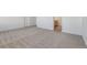 Spacious bedroom featuring plush carpet, neutral walls, and access to the ensuite bathroom at 17847 Dandy Brush Dr, Parker, CO 80134