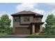 Modern two-story home featuring a two-car garage, stone accents, and a well-manicured lawn at 17847 Dandy Brush Dr, Parker, CO 80134
