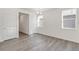 Bright room with hard surface flooring and natural light streaming in from the windows at 17847 Dandy Brush Dr, Parker, CO 80134