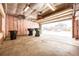 View of an insulated garage with the door opening to the street at 1940 W 101St Ct, Thornton, CO 80260