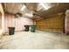 Wide shot of an insulated garage with a heater unit at 1940 W 101St Ct, Thornton, CO 80260