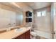 Comfortable bathroom featuring a vanity with a sink and a combined bathtub and shower at 13018 Niagara Way, Thornton, CO 80602