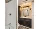 Stylish bathroom featuring a vanity with a sink and a bathtub at 13018 Niagara Way, Thornton, CO 80602