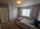 Bedroom featuring a bed with a stuffed shark at 13018 Niagara Way, Thornton, CO 80602