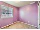 Unique bedroom featuring carpet, window with blinds, and colored walls for a unique ambiance at 13018 Niagara Way, Thornton, CO 80602