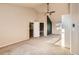 Bright bedroom with vaulted ceiling, ceiling fan, view to bath, and a closet at 13018 Niagara Way, Thornton, CO 80602