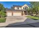 Charming two-story home with a three-car garage, well-kept lawn, and inviting curb appeal at 13018 Niagara Way, Thornton, CO 80602