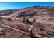 Aerial view showing home's location on a hillside lot at 12041 Twilight St, Longmont, CO 80503