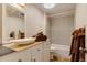 Clean basement bathroom with updated vanity and shower/tub combo at 12041 Twilight St, Longmont, CO 80503