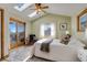 Spacious bedroom with private deck access and wood floors at 12041 Twilight St, Longmont, CO 80503