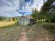 Exterior view of a charming house with a stone path leading to the entrance at 12041 Twilight St, Longmont, CO 80503