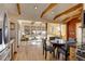 Open concept kitchen flows into living area with wood floors at 12041 Twilight St, Longmont, CO 80503