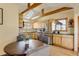 Bright kitchen with stainless steel appliances and wood cabinets at 12041 Twilight St, Longmont, CO 80503