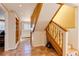 Rustic wooden staircase leading to the upper level at 12041 Twilight St, Longmont, CO 80503