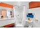 Bathroom with a stylish vanity, shower with a curtain, and modern fixtures at 415 Lamar St, Lakewood, CO 80226