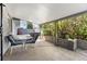 Covered patio with outdoor seating, perfect for entertaining or relaxing outdoors at 415 Lamar St, Lakewood, CO 80226