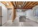 Unfinished basement with exposed ceiling featuring a ping pong table at 5503 Fullerton Cir, Highlands Ranch, CO 80130