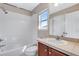 A full bathroom features a tub and a large mirror at 5503 Fullerton Cir, Highlands Ranch, CO 80130