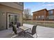 Outdoor deck space with a table and chairs, perfect for relaxation and enjoying the outdoor scenery at 5503 Fullerton Cir, Highlands Ranch, CO 80130