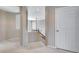 Spacious hallway with a staircase and an open floor plan at 5503 Fullerton Cir, Highlands Ranch, CO 80130