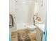 Bathroom featuring wood-look flooring, vanity, toilet, and standing shower at 14413 E Jewell Ave # 201, Aurora, CO 80012
