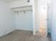 Bedroom featuring closet and doorway leading to another room at 14413 E Jewell Ave # 201, Aurora, CO 80012