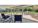 Backyard covered patio with lounge seating and outdoor furniture, perfect for relaxation and entertaining at 269 Beryl Way, Broomfield, CO 80020