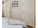 Bedroom with wood floors, white trim, and ample closet space at 269 Beryl Way, Broomfield, CO 80020