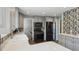 Modern kitchen with stainless steel appliances, gray cabinets, and quartz countertops at 269 Beryl Way, Broomfield, CO 80020