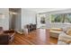 Cozy living room featuring hardwood floors, comfortable seating, and lots of natural light at 269 Beryl Way, Broomfield, CO 80020